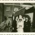 Plechtige communicant met familie